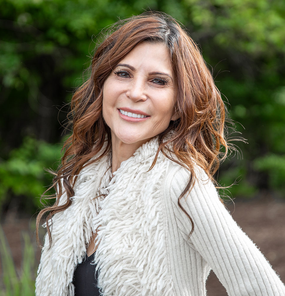 lady outside nice jacket beautiful smile