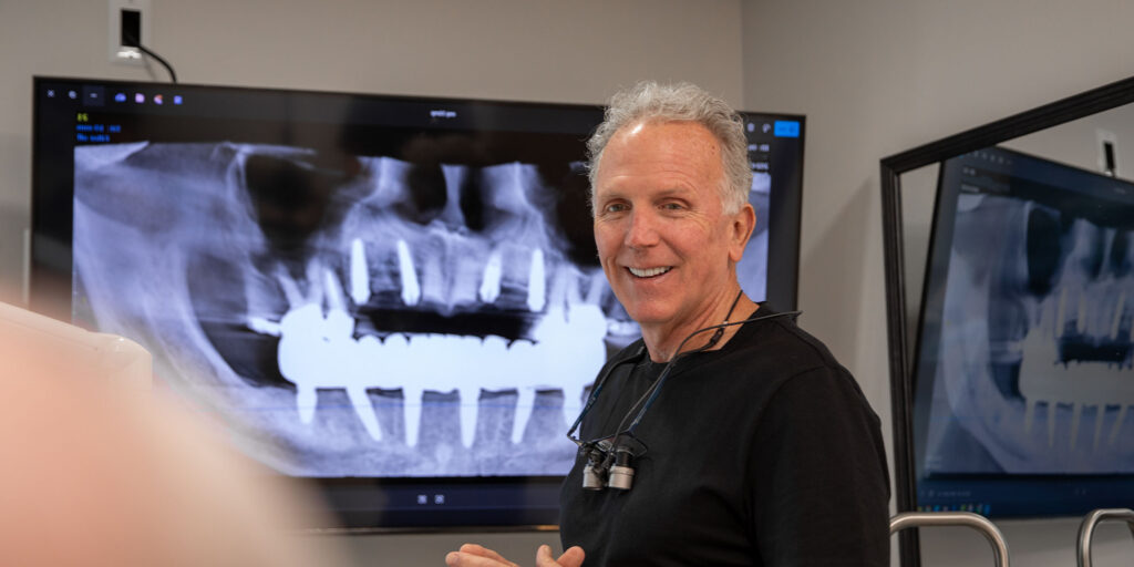 dr doolin showing scans on screen