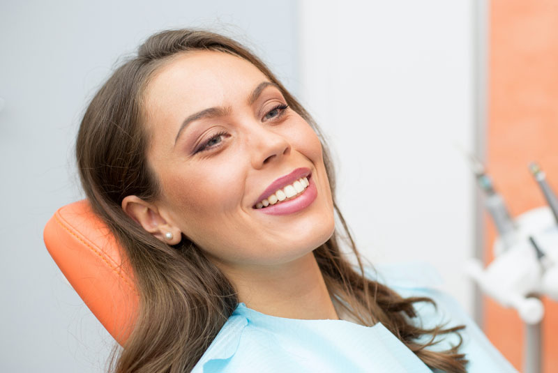 person with nice smile in procedure room
