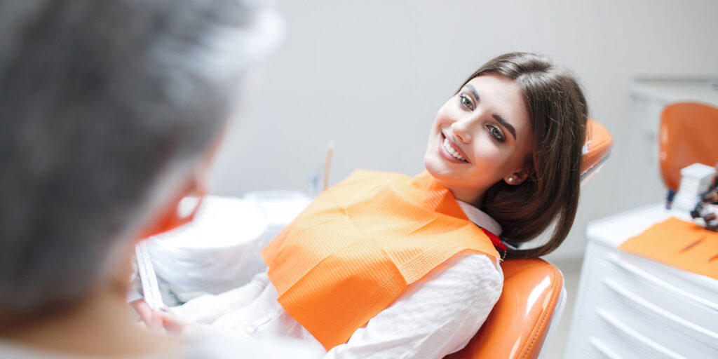 person talking to their dentist